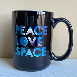 Peace Love Space The Franklin Institute cosmic coffee mug in black and blue